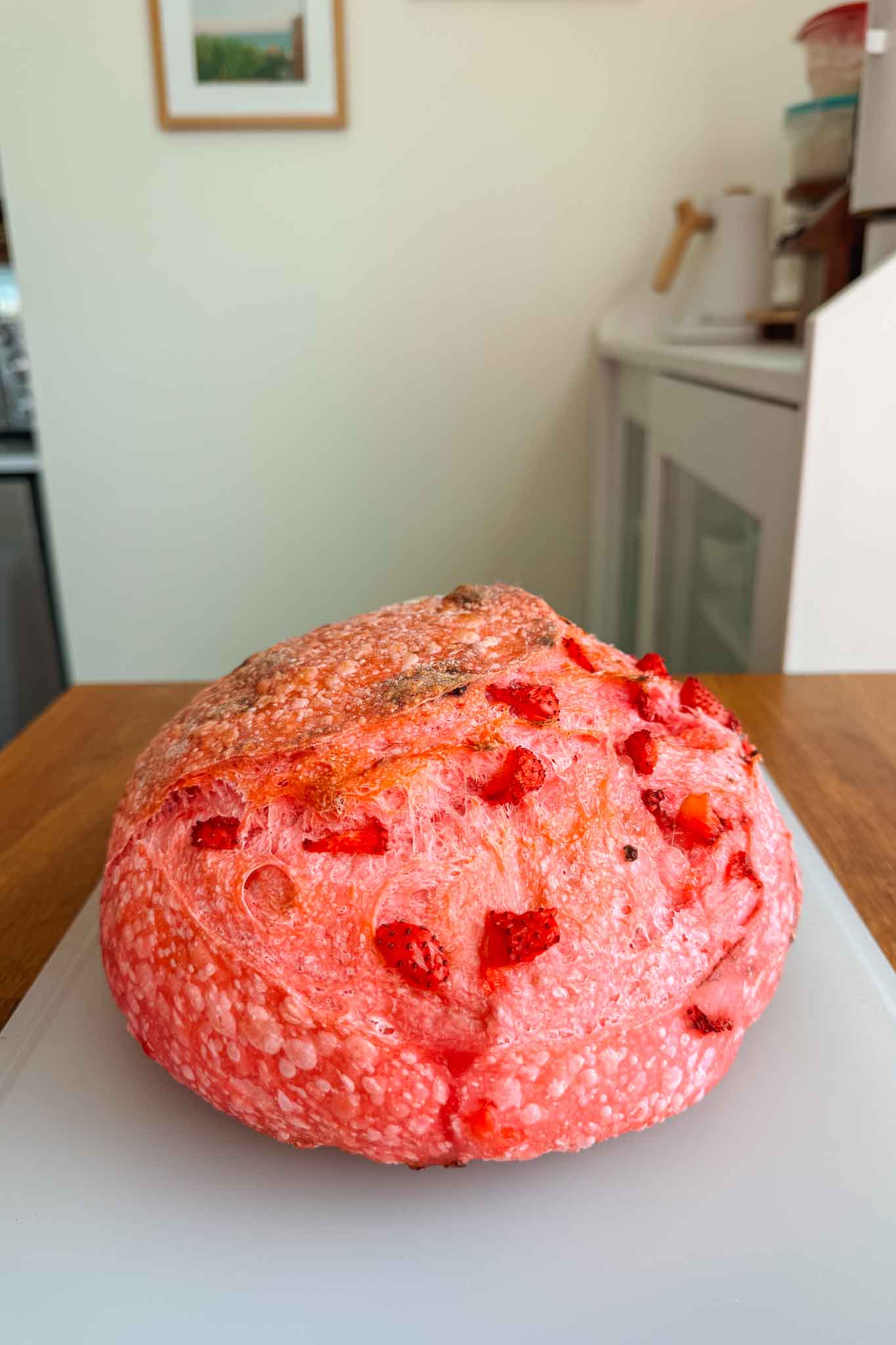 Strawberry sourdough bread on cutting board