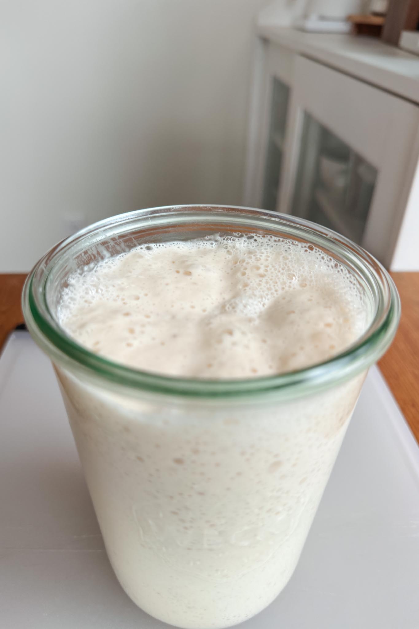 Active sourdough starter in jar